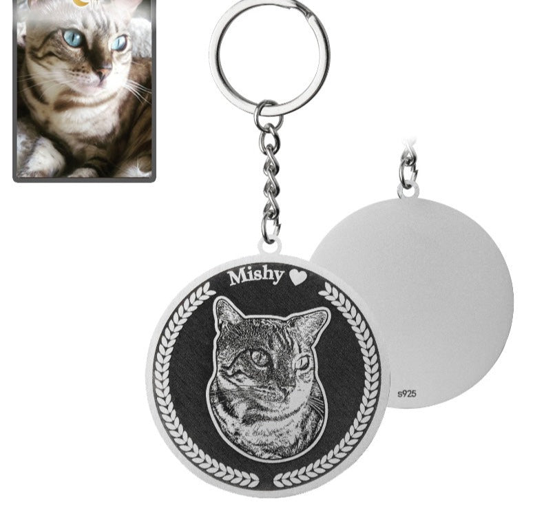 Porta-chaves redondo com medalhão de silhueta de gato